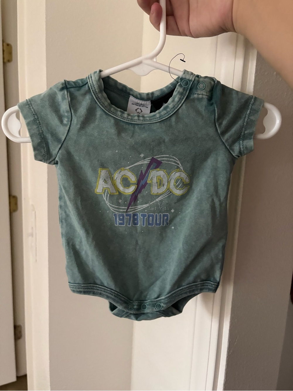 AC/DC Teal Green Baby Onesie with Lightning Bolt Graphic